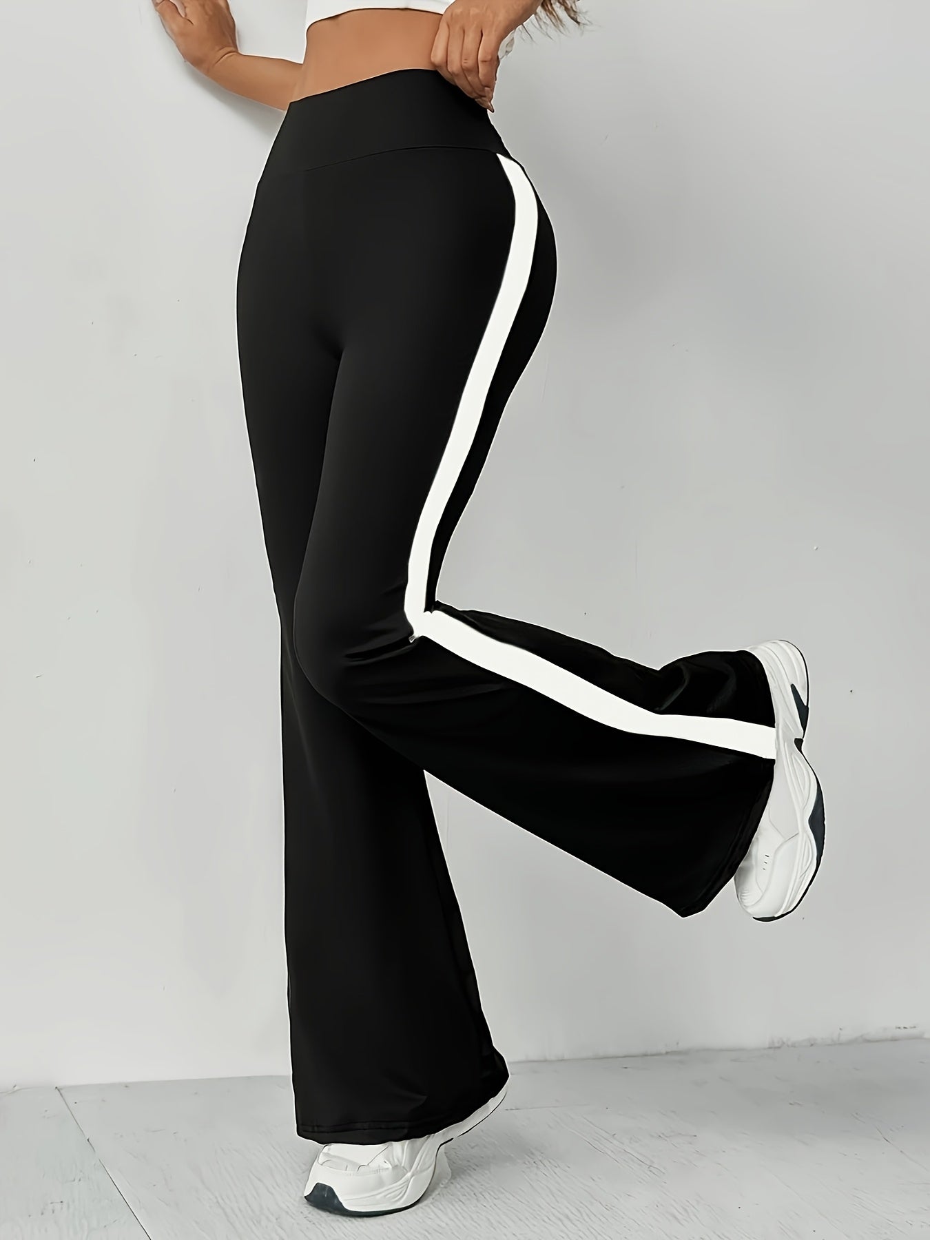 High-Waist Black Flare Pants with White Side Stripes | and Leg-Lengthening, Casual Style, Suitable for All Seasons
